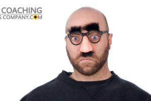Man wearing fake glasses nose and eyebrows